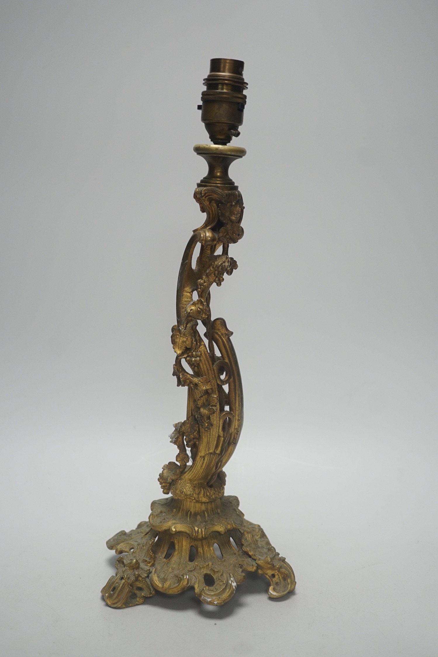 A 19th century French rococo style ormolu candlestick, converted to table lamp, 39cm tall